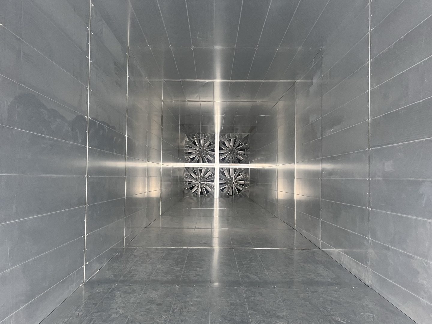 Looking down the inside of the TU Eindhoven wind tunnel towards its fan wall